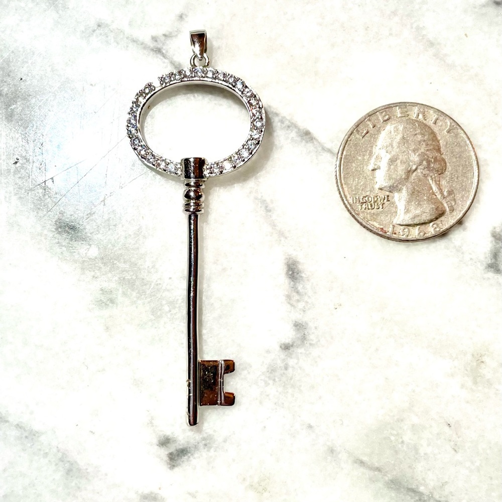 Beautiful 925 sterling silver key with CZ’s